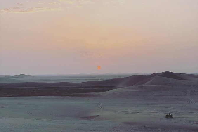 4 Hour Desert Safari, Camel Ride & Inland Sea Beach - Sandboarding and the wide desert views