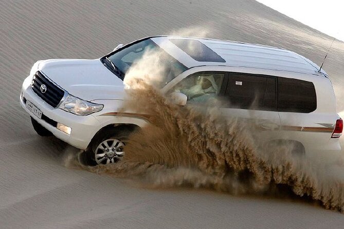 4hr Desert Safari: Sunset,Sunrise,Camel,Sand boarding,Inland Sea - The Inland Sea and the Saudi border