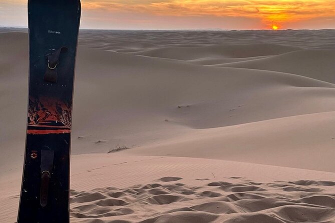 4hr Desert Safari: Sunset,Sunrise,Camel,Sand boarding,Inland Sea - The camel ride and falcon stop