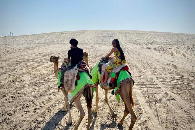 Camel trekking on the Dunes with Sunset - Why the sunset timing matters in Qatar