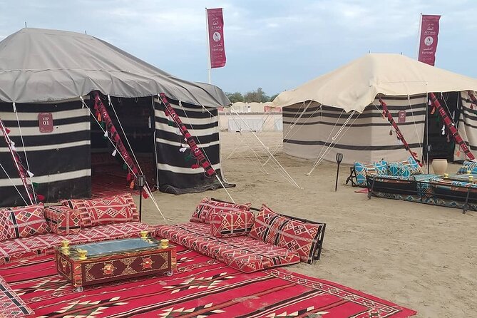 Desert Safari and Inland Sea(Private Tour) - Mesaieed Beach brings camels, falcons, and tea