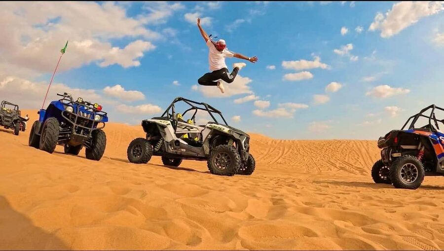 Desert Safari, QuadBike,Dune buggy, Sandboarding & CamelRide - Quad biking at Mesaieed