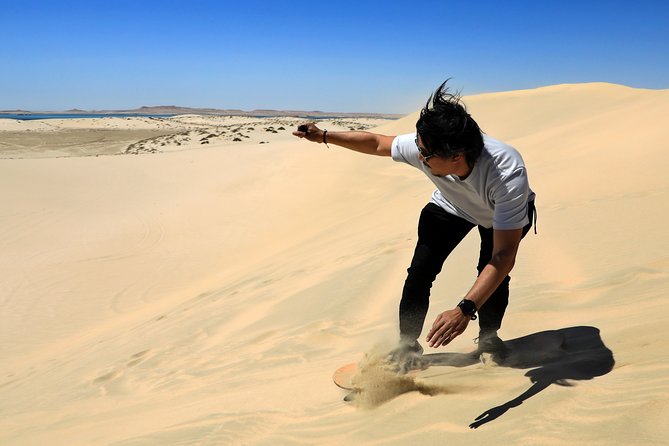 Desert Safari with Camel Ride, Sand Boarding & Inland Sea Tour in Doha - The camel stop is fun, short, and photo focused