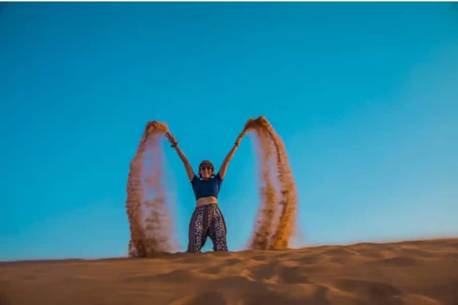 Doha: ATV Quad, Buggy Dune Bashing,Camel Ride & Sandboarding - Sandboarding on Qatar’s rolling dunes