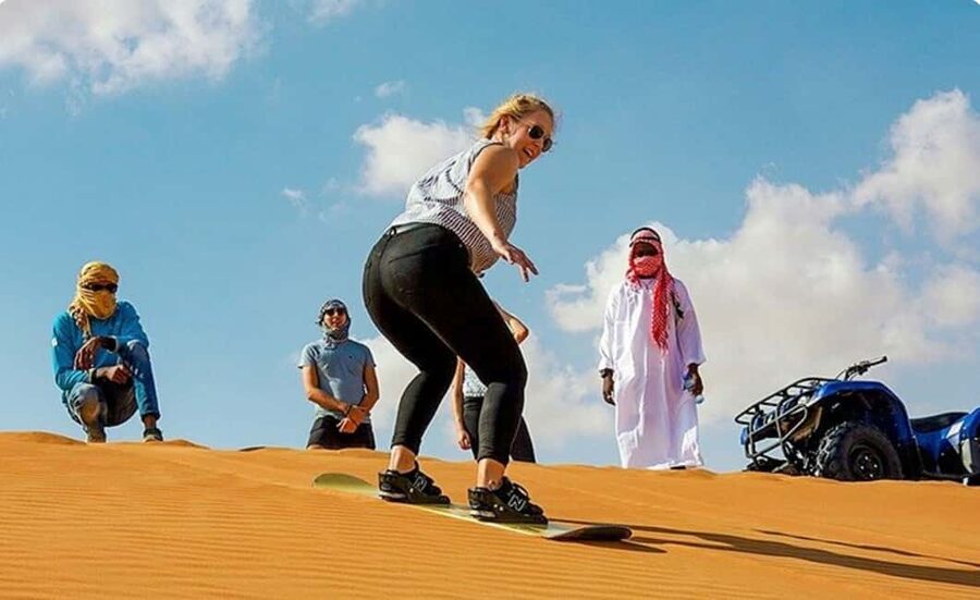 Doha: ATV, Quad or Buggy, Dune Bashing, Camel & Sandboarding - Leaving Doha for the Inland Sea
