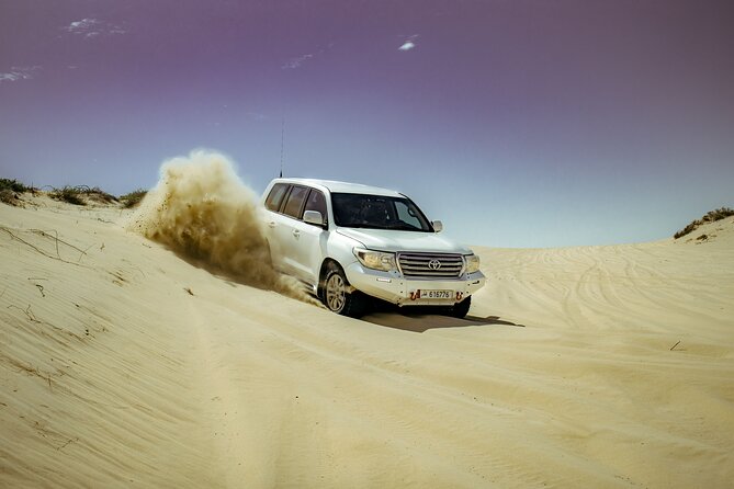 Doha Delights City Tour with Desert Safari and Inland Sea Visit - The day begins with Doha’s waterfront and old port