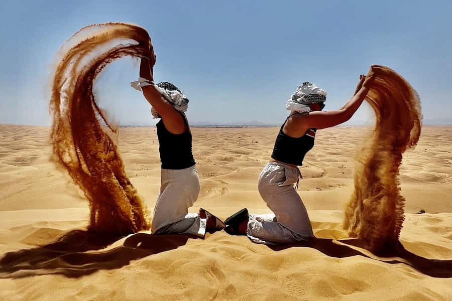 Doha: Desert 4x4, ATV/Quad, Camels, Sandboarding, Inland sea - Camel ride and sandboarding add two different kinds of fun