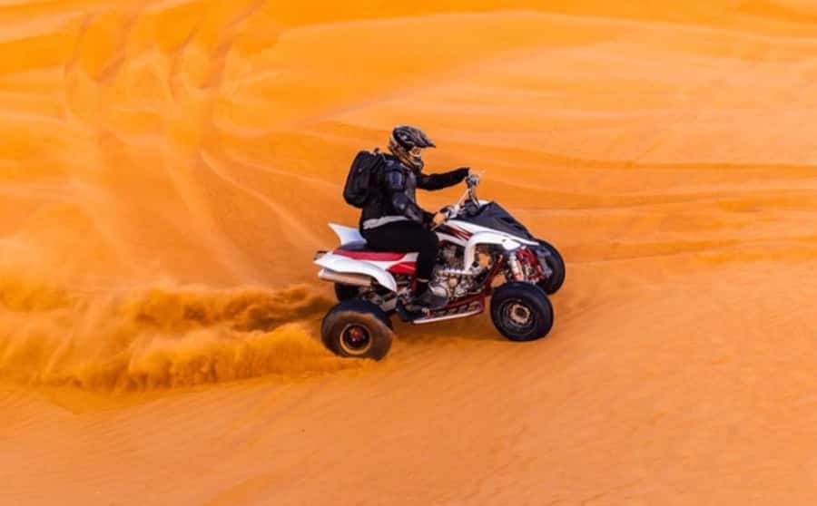 Doha: Desert All Activities ATV Quad Bike, Dune Bashing - Dune bashing toward Qatar’s inland sea
