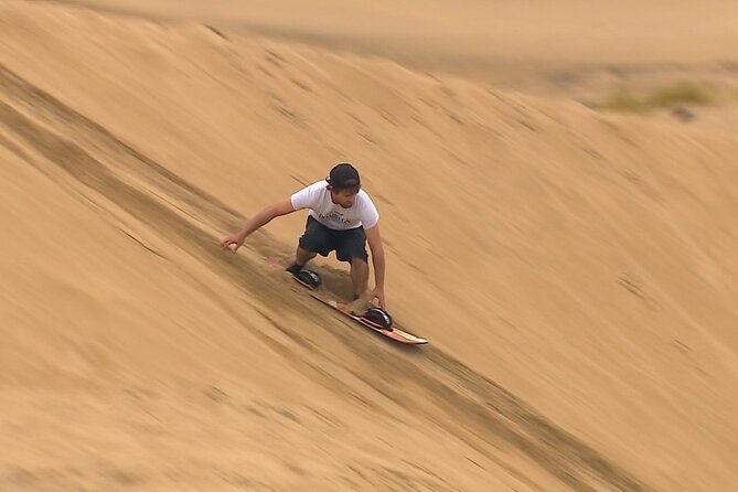 Doha Desert Quad Bike adventure with group, and Sand dune Driving - From Doha’s National Museum to the open desert