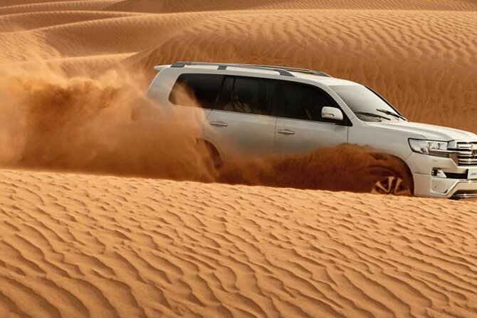 Doha Desert Quad Bike adventure with group, and Sand dune Driving - Camel encounters and a traditional touch