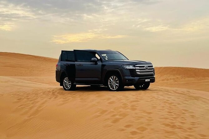 Doha: Desert Safari: Dune Bashing, Quad Bikes & Camel Rides - Sandboarding and photographs at Tourist Point
