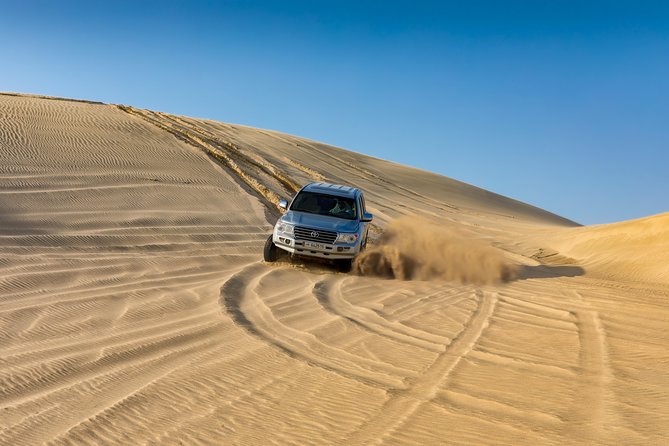 Doha Desert Safari: Dunebashing, Camel, Sandboarding & Inland Sea - A short camel ride with time for photos