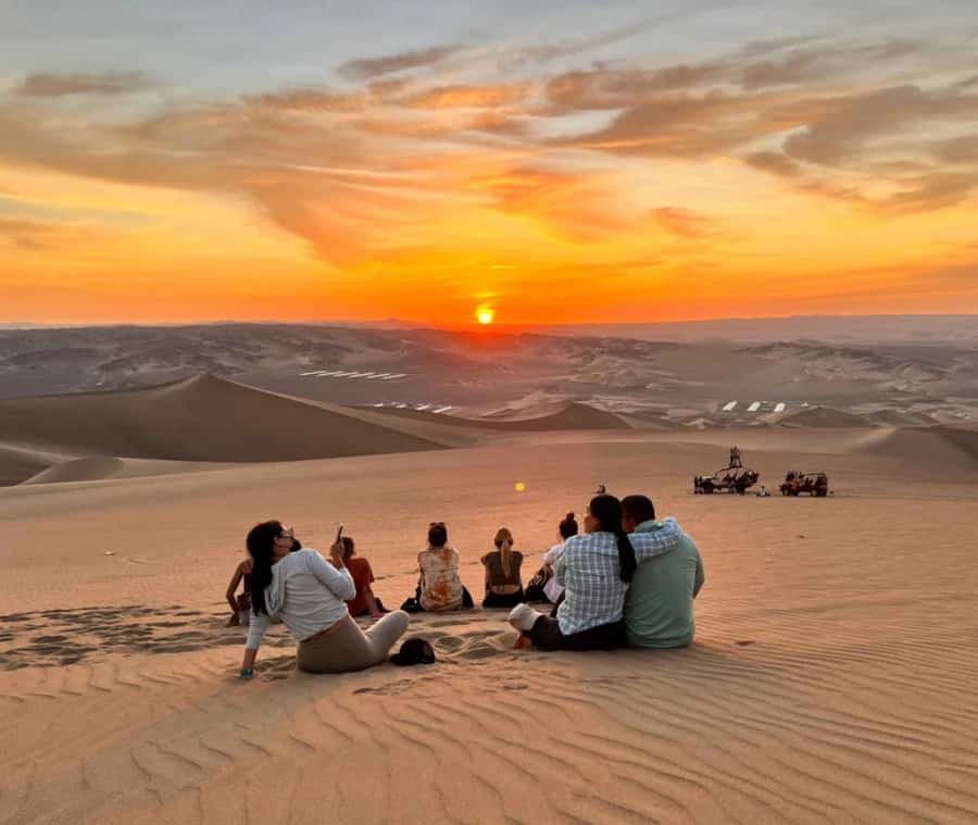 Doha: Desert Safari, Quad Bike, Camel Ride & Inland Sea - Quad biking across Qatar’s sand