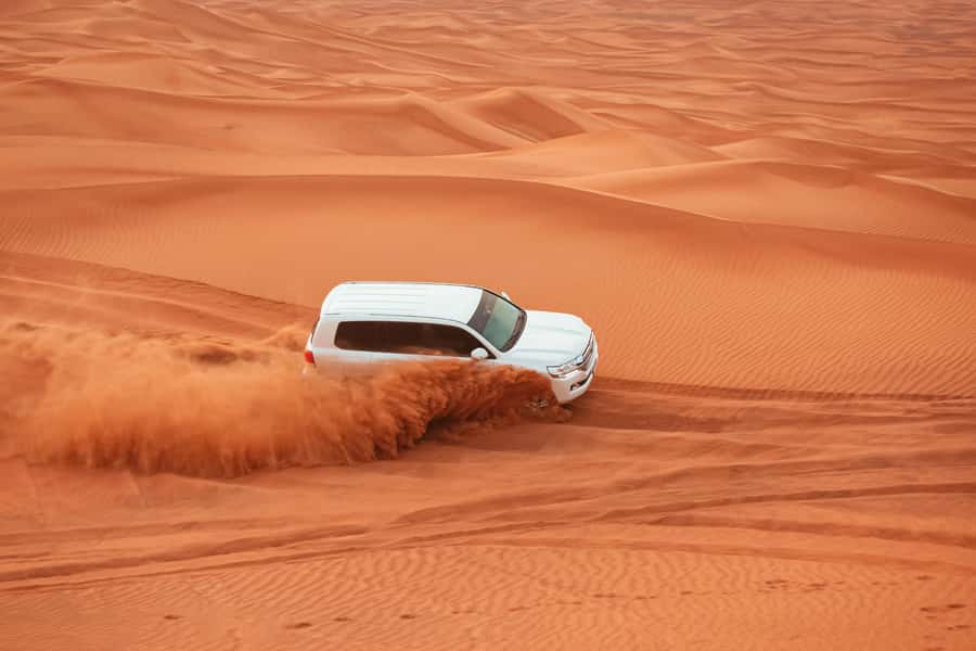 Doha: Desert Safari, Sandboarding, Dune Bashing & Inland Sea - Sandboarding: simple, messy, and worth trying