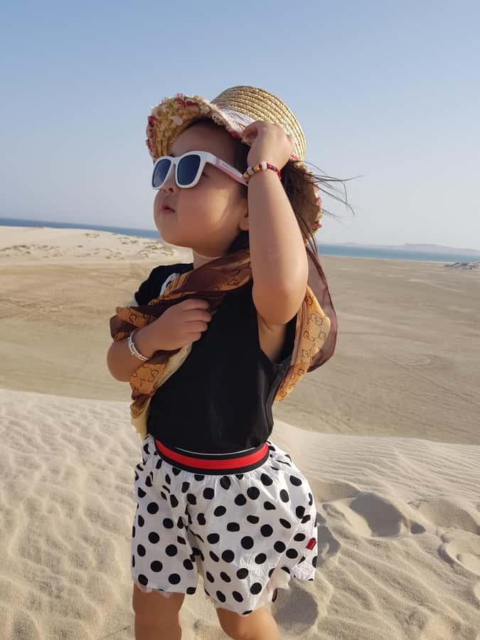 Doha: Desert Safari with Camel Ride Family Friendly Tour - Sandboarding for a simple, satisfying thrill