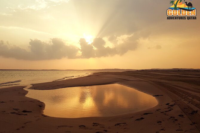 Doha: Desert Safari With Quad bike ,Camel Ride And Sand Boarding - Sandboarding on the dunes