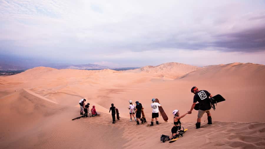 Doha: Dune Bashing Safari, Falcon, Camel, ATV, Sandboarding - A four-hour route from Doha to the sand