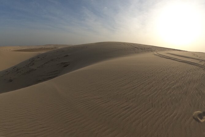 Doha: Escape to Eternity, Relaxing Desert Wonders with Camel Ride - Sunset, stars, and the pace of the evening