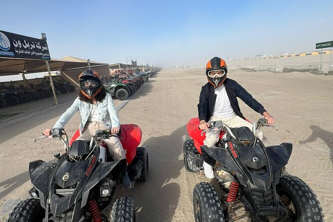 Doha Half Day Desert Safari Dune Bashing Camel Ride Sandboarding - Dune bashing in a private 4x4