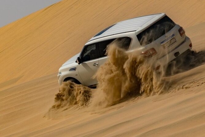 Doha Half Day Desert Safari Dune Bashing Camel Ride Sandboarding - A 10-minute camel ride and Bedouin tent stop
