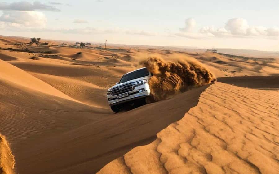 Doha: Half Day Desert Safari, Dune Bashing, Camel Ride - The Land Cruiser turns the sand into a roller coaster