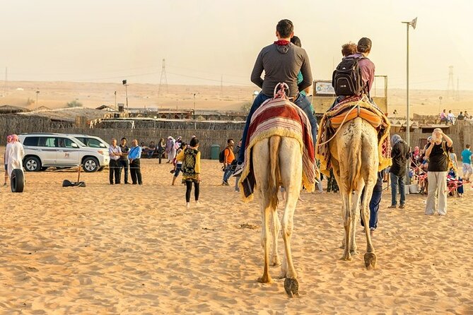 Doha Half Day Desert Safari Dune Bashing CamelRide & Sandboarding - Sandboarding on the dunes