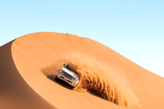 Doha Half Day Desert Safari with Camel Ride and Sand Boarding - Dune bashing with Safeer, Tariq, or Ishaq