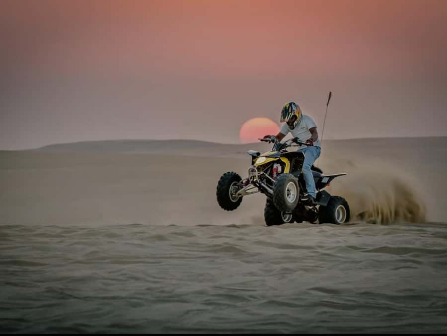 Doha: Half Day Desert Safari With Camel Ride & Sand Boarding - Sandboarding keeps the Inland Sea stop active