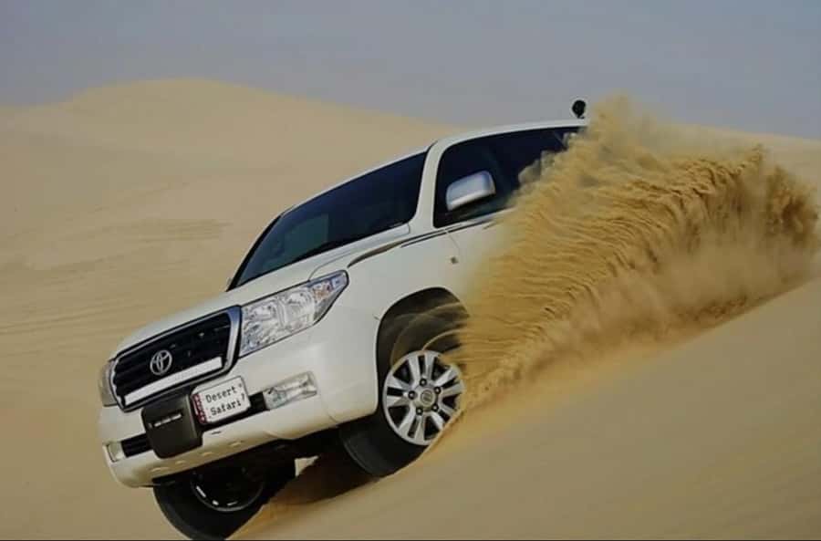 Doha: Half Day Desert Safari With Camel Ride & Sand Boarding - Mesaieed brings the first desert stop
