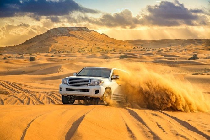 Doha : Half Day Desert Safari With SandBoarding and Camel Ride - From Doha to the Sealine dunes