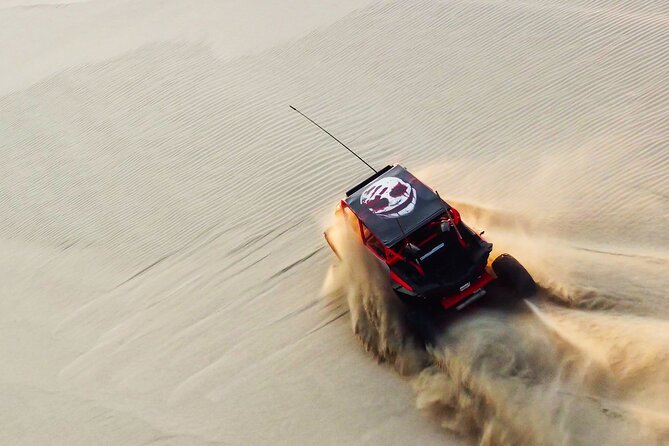 Doha-Half Day Safari with Quad Bike ATV/Camel Ride/sandboard - Dune bashing with a professional off-road driver