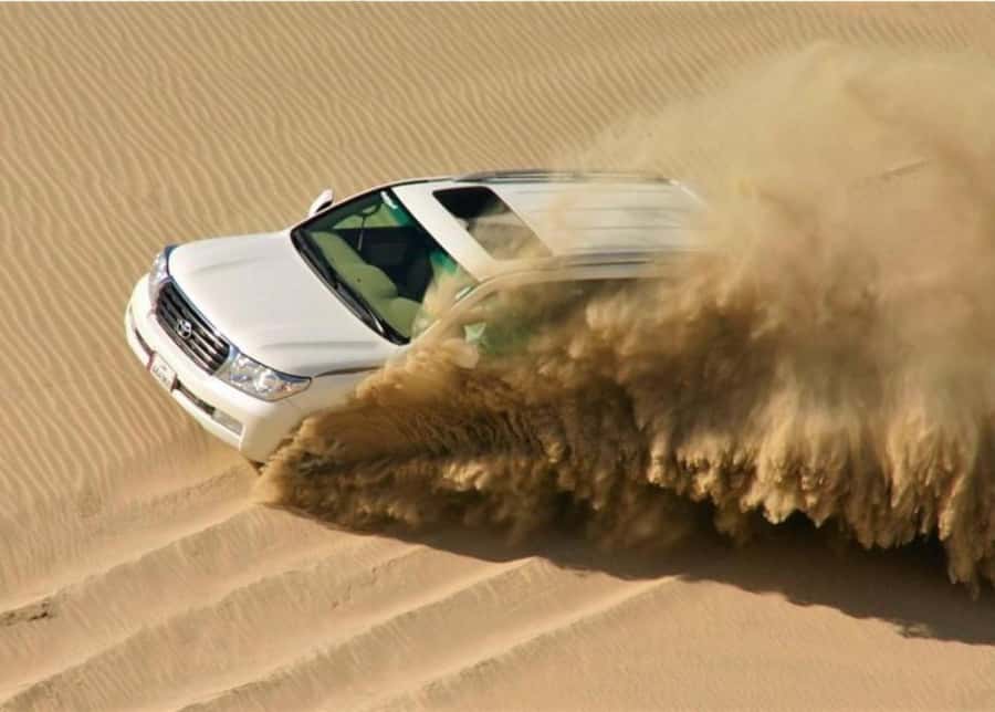Doha : Inland Sea Desert Safari ,Camel Ride & Sandboarding - Meeting the camel handlers
