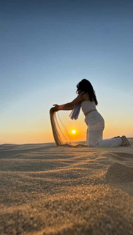Doha: inland sea Tour With Dune Bashing &Sandboarding fun - Sandboarding on Qatar’s golden dunes