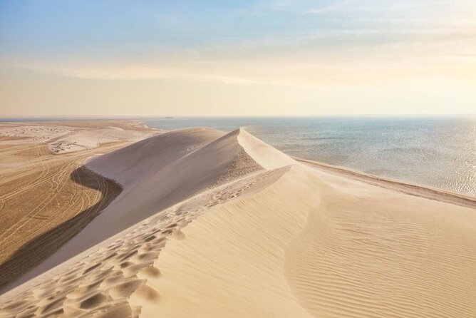 Doha Layover or Doha Stopover Tour with Desert & City Tour - Katara Cultural Village in 45 minutes