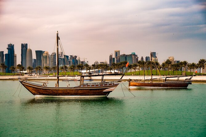 Doha Night City Tour With Pickup From Doha airport and Hotels - Doha at night, from old souq to new towers