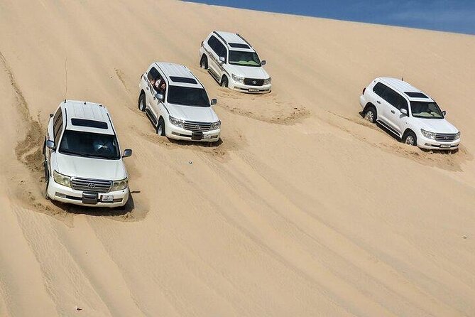 Doha Qatar ATV Quad Bike Buggy Desert Adventure and Camel Ride - Khor Al Adaid, where the dunes meet the Gulf