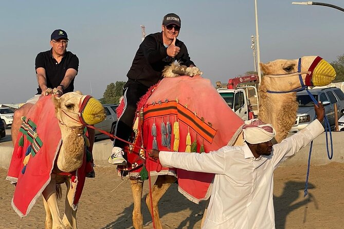 Doha Qatar ATV Quad Bike Buggy Dune Bashing and Camel Ride - Camel ride, Bedouin tent, and falcon photos