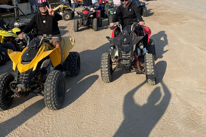 Doha Qatar ATV Quad Bike Buggy Dune Bashing and Camel Ride - Dune bashing and sandboarding at Sealine Beach