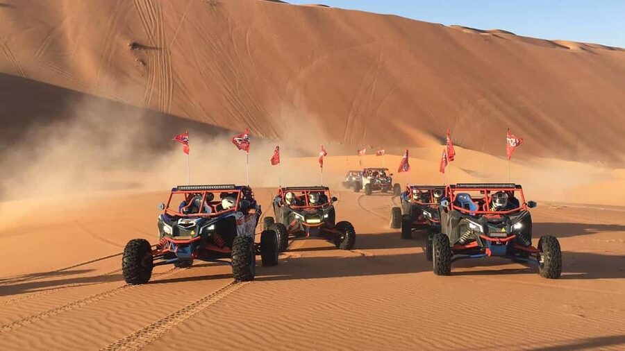 Doha Qatar Buggy ride, camel ride, dune bashing, sandboard. - A quick camel ride at Sealine