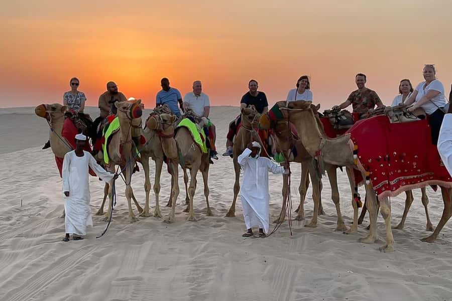 Doha Safari: ATV Ride, Dune Bashing, & Sandboarding Fun - Tea and a short camel ride at a local camp