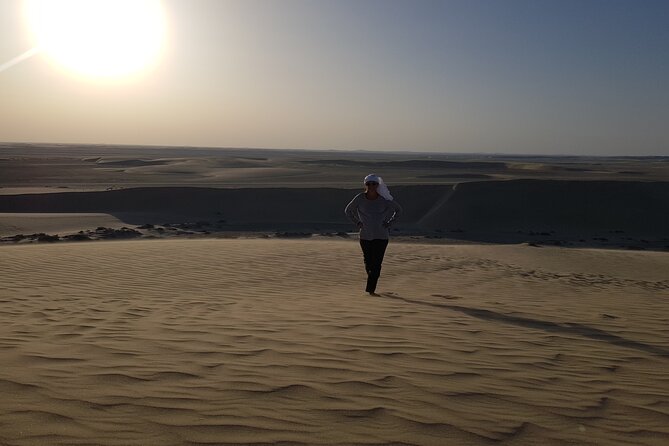Doha: Sunrise /Sunset Desert Safari with Sand Boarding,Camel ride - Sandboarding and the best photo stops