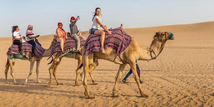 Doha: Sunset Desert Safari, ATV, Camel Ride and Sandboarding - Khor Al Adaid, where the desert meets the inland sea