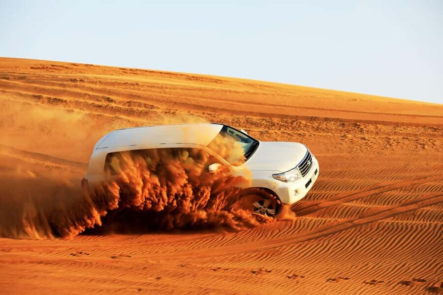 Doha: Sunset Desert Safari, ATV, Camel Ride and Sandboarding - What to wear and what to leave behind