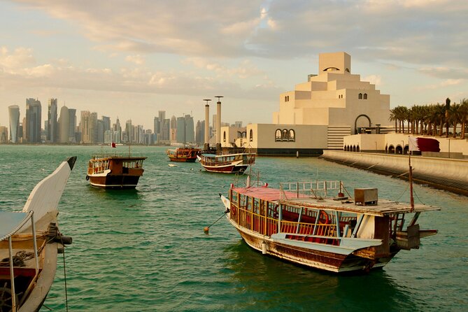 Doha Traditional Dhow Cruise With Corniche Walk - Sunset, city lights, and the changing mood