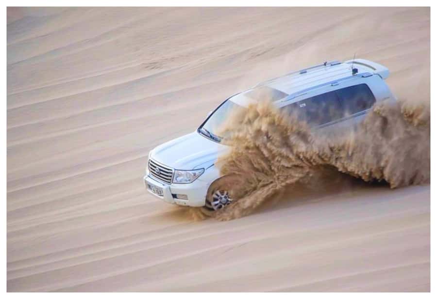 Dune Bashing, Sandboarding, Camel Ride & Optional ATV Ride - The camel stop and Qatari tea