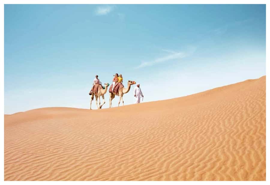 Dune Bashing, Sandboarding, Camel Ride & Optional ATV Ride - Optional ATV riding on a desert track