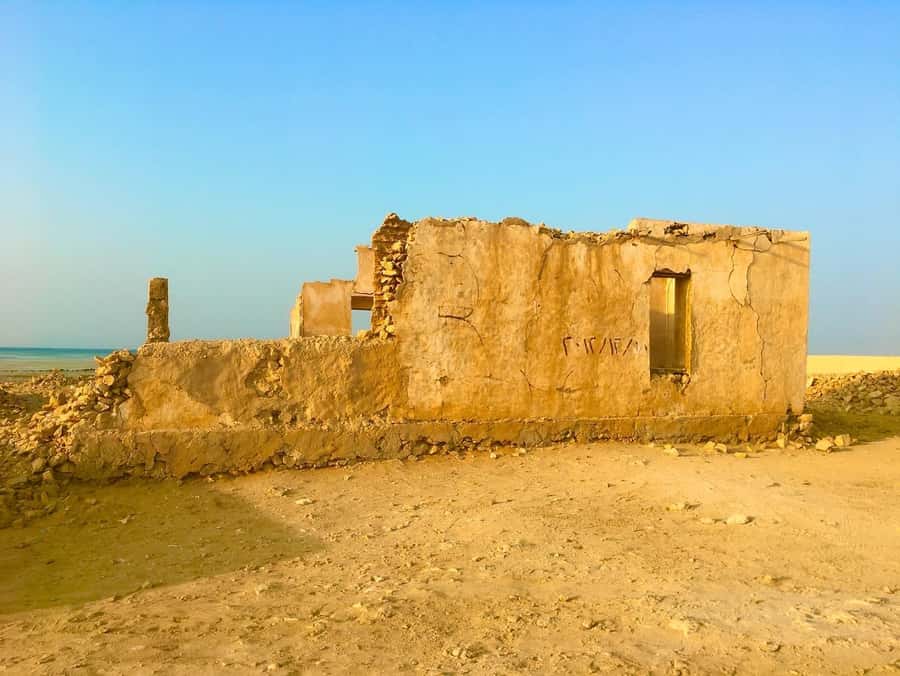 Explore North Qatar with history and archaeological sites. - Al Bayt Stadium and the road north