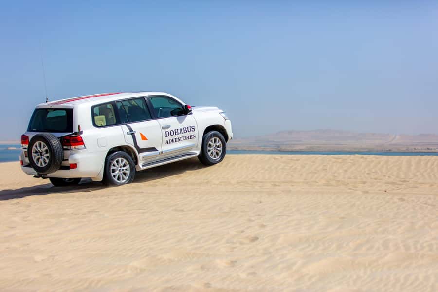From Doha: 8-hour Safari Tour with Desert Beach Experience - Leaving Doha in a private Land Cruiser