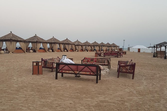 Full Day Desert Safari with Buffet Dinner,Sand Boarding & Camel Ride - Dune bashing across Qatar’s sand