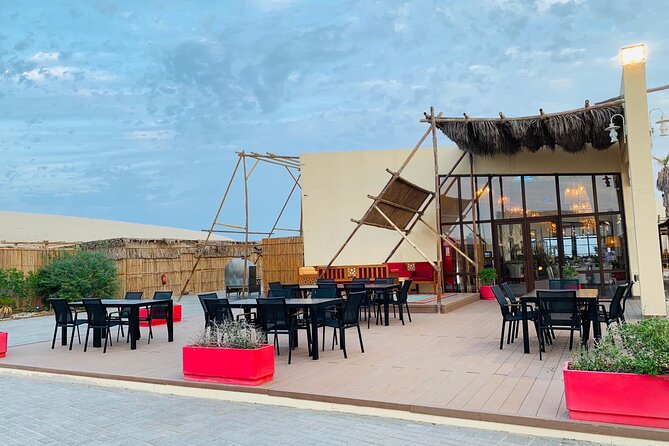 Full-day Qatar desert safari: dune bashing, sandboarding, camels - Singing dunes and the odd sound of moving sand